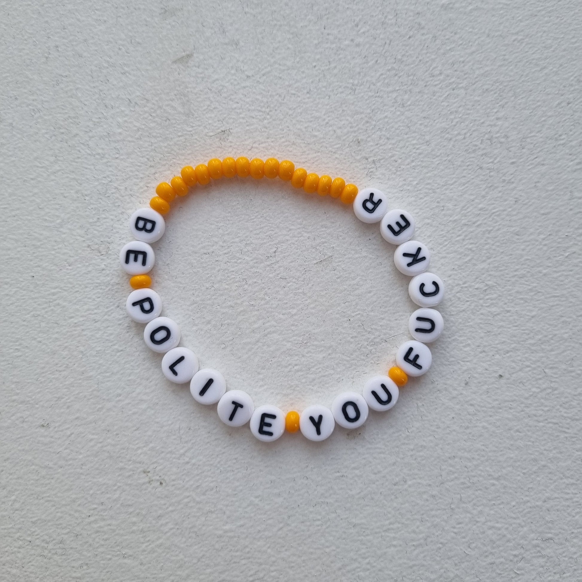 VAGPWR Bracelet Orange Bracelet - Be Polite